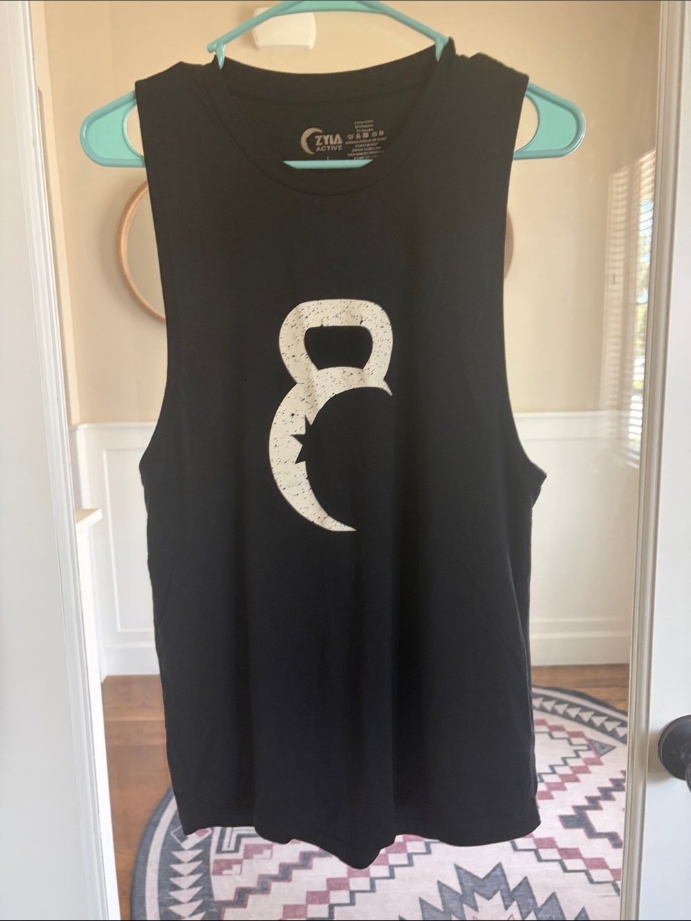 ZYIA Black Muscle Tee with Distressed White Kettlebell Graphic